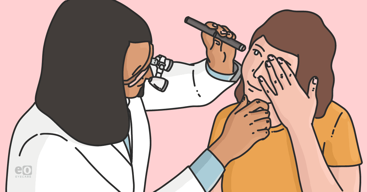 Image of an ophthalmologist examining a patient with an open corneal wound.