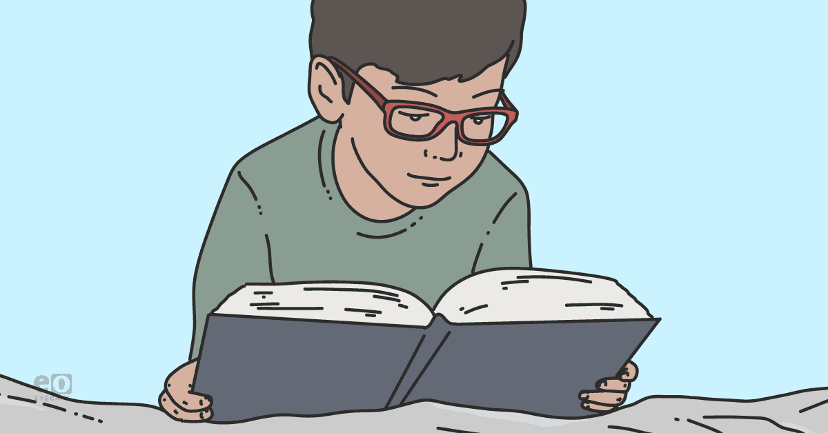 Image of a child reading a book while wearing myopia control glasses to represent how to identify pre-myopia and myopia in pediatric patients.