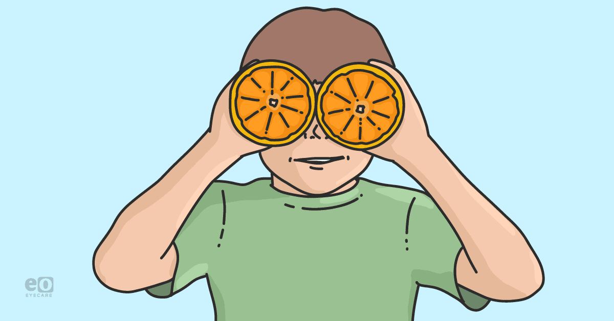 Image of a child holding two halves of oranges over their eyes to represent dietary choices to help slow myopia progression in children.